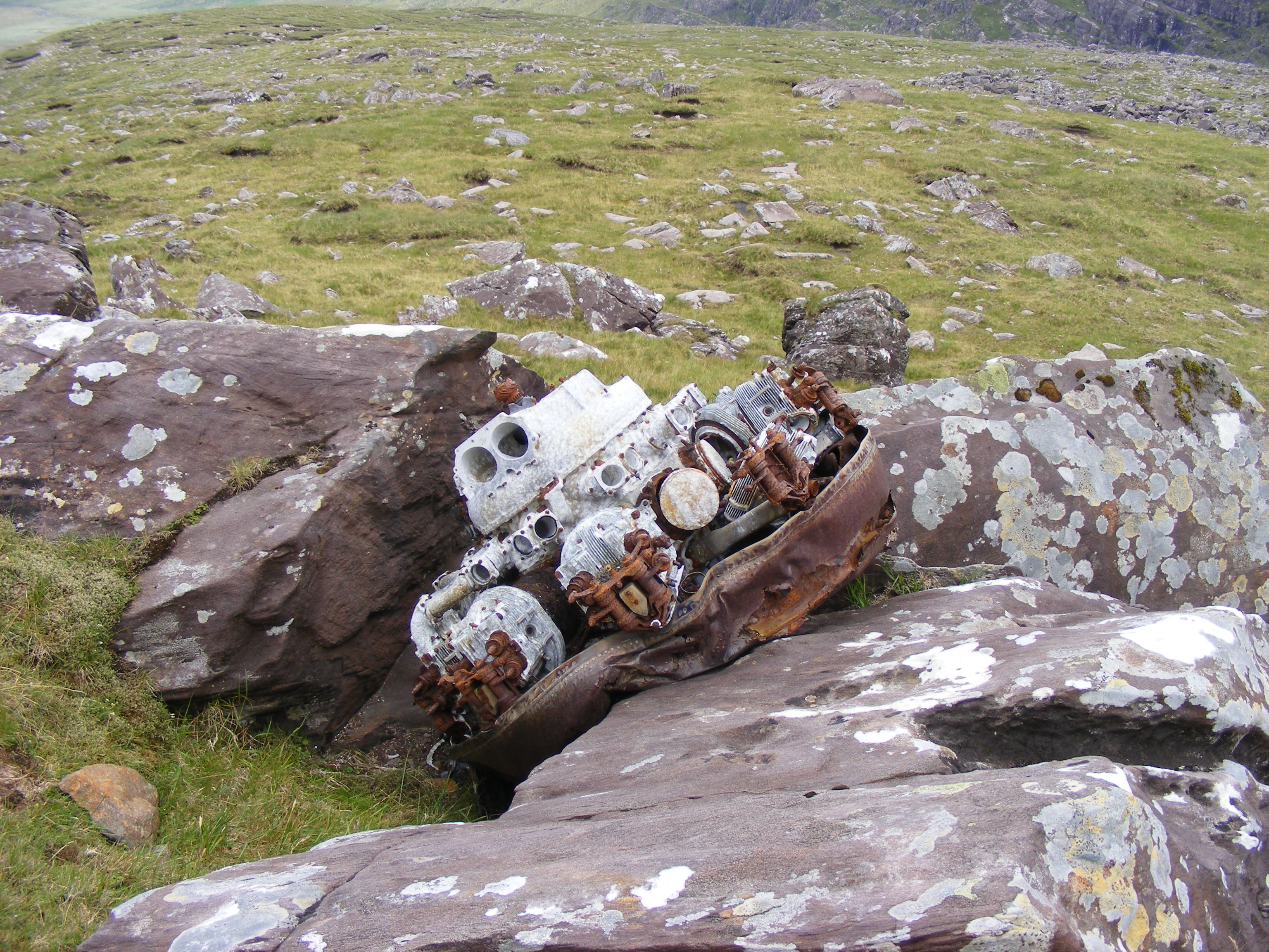 Another of G-AGES engines with front mounted
              exhaust ring, lying as it fell on a rock.