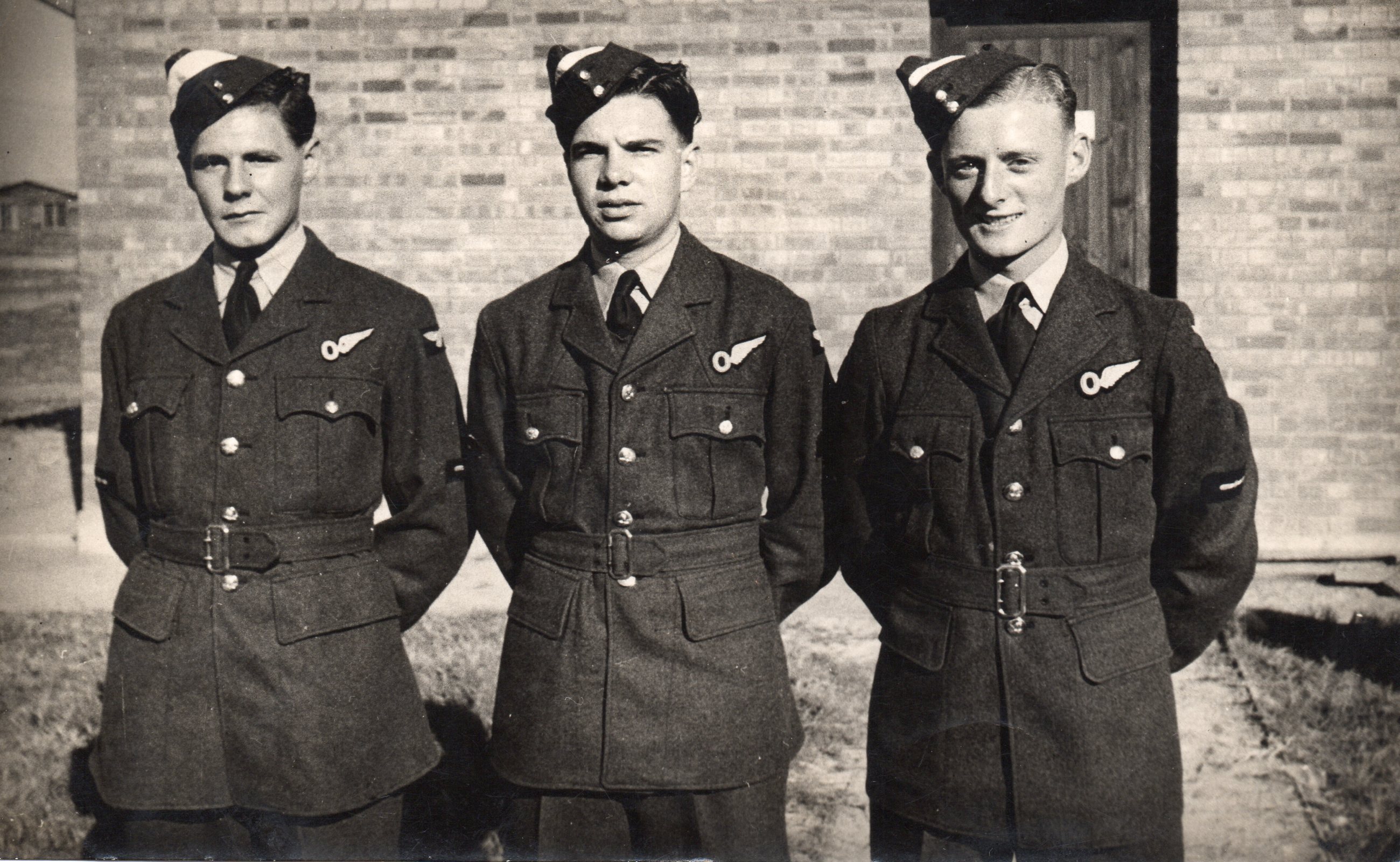 Groups of 3 airmen, J C McGhee at right